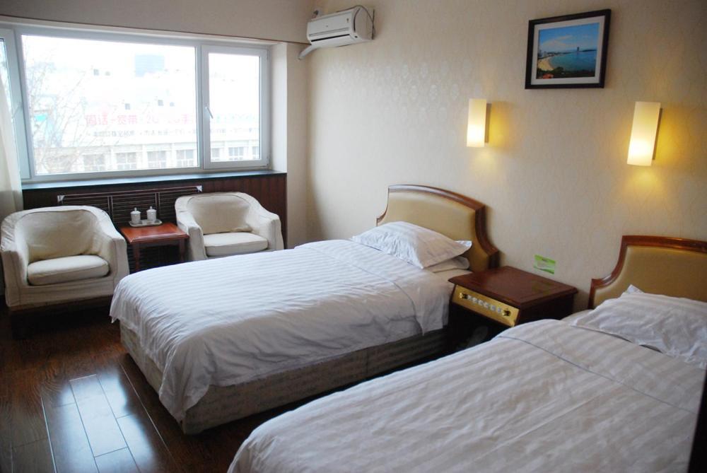 Hotel Nanyang Čching-tao Pokoj fotografie